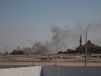 Smoke rises from a reported Iranian strike in the area where the US Embassy is located in Kuwait City 
