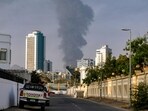 A tall smoke plume billows following an explosion in the Fujairah industrial zone on March 3, 2026.