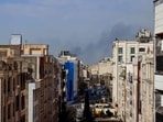 A plume of smoke rises following a reported explosion in Tehran, after two loud blasts were heard in Tehran on the morning of February 28.
