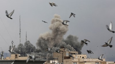 Birds fly as smoke rises following an explosion, after Israel and the U.S. launched strikes on Iran, amid the U.S.-Israel conflict with Iran, in Tehran, Iran, March 2, 2026. Majid Asgaripour/WANA (West Asia News Agency) via REUTERS ATTENTION EDITORS - THIS PICTURE WAS PROVIDED BY A THIRD PARTY (via REUTERS)