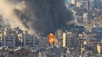 TOPSHOT - Smoke plumes billow following Israeli bombardment on Beirut's southern suburbs on March 2, 2026. The war launched by the United States and Israel against Iran spread across the Middle East on March 2 with Lebanon's Hezbollah entering the fray and a British air base in Cyprus targeted. (Photo by IBRAHIM AMRO / AFP) (AFP) TOPSHOT - Smoke plumes billow following Israeli bombardment on Beirut's southern suburbs on March 2, 2026. The war launched by the United States and Israel against Iran spread across the Middle East on March 2 with Lebanon's Hezbollah entering the fray and a British air base in Cyprus targeted. (Photo by IBRAHIM AMRO / AFP) (AFP)