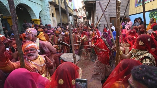 Holi 2026: Lathmar Holi attracts visitors from around the world. Whether you are dodging a stick in Barsana or dancing in a procession in Goa, the spirit of Holi is an inescapable invitation to let go and live in colour. (File Photo/ AP)