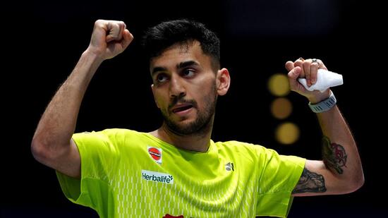 India's Lakshya Sen celebrates winning his men's singles match against China's Shi Yuqi. (AP)