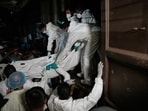 Healthcare workers unload the bodies of Iranian sailors from a vehicle who died when their IRIS Dena warship sank outside Sri Lanka's territorial waters, in Galle, Sri Lanka, Wednesday, March 4, 2026. Healthcare workers unload the bodies of Iranian sailors from a vehicle who died when their IRIS Dena warship sank outside Sri Lanka's territorial waters, in Galle, Sri Lanka, Wednesday, March 4, 2026.