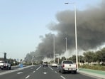 Smoke billows from Zayed port after an Iranian attack, following United States and Israel strikes on Iran, in Abu Dhabi.
