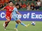 India's Sanfida Nongrum (right) scores her team's first goal against Vietnam in the Women's Asian Cup in Perth. (AP)