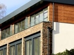 Plot or apartment: Does it make financial sense to buy land first and build when finances allow?