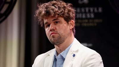 Magnus Carlsen attends a news conference (REUTERS)