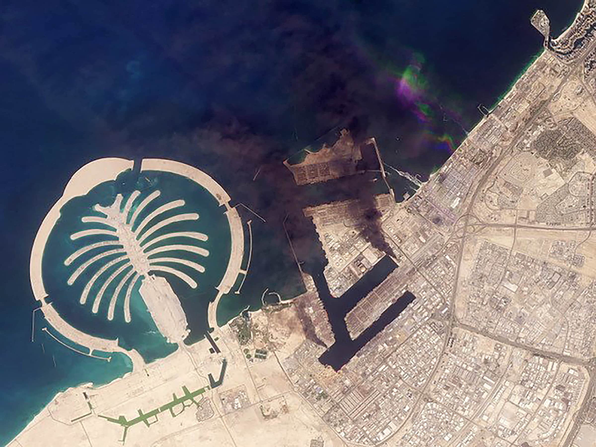 This handout satellite image taken by 2026 Planet Labs PBC on March 2, 2026 shows smoke plumes billowing in Dubai after a projectile strike. (AFP) This handout satellite image taken by 2026 Planet Labs PBC on March 2, 2026 shows smoke plumes billowing in Dubai after a projectile strike. (AFP)