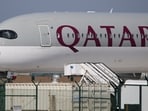 FILE PHOTO: A Qatar Airways plane sits on the tarmac at Los Angeles International Airport (LAX) in Los Angeles, California, U.S. March 3, 2026. REUTERS/Daniel Cole/File Photo