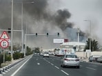 Dubai news; Smoke rises after reported Iranian missile attacks, following United States and Israel strikes on Iran, as seen from Doha, Qatar, 