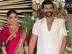 Vijay Deverakonda turns protective husband at his, Rashmika Mandanna's wedding reception.