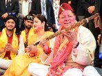 Pushkar Singh Dhami participates in a Holi Milan programme with folk artists at the chief minister’s residence in Dehradun.