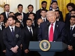 Lionel Messi listens as President Donald Trump speaks during an event with Inter Miami CF
