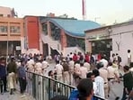 Heavy security was witnessed in the Uttam Nagar area to disperse the massive crowd that gathered outside the Uttam Nagar PS in support of Tarun's father, who staged a sit-in protest against the death of his son, allegedly due to a fight during Holi, in New Delhi on Friday.