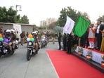 Chief minister Yogi Adityanath flagging off 50 Quick Response Team (QRT) motorcycles for the UP Police. (Sourced)