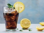 It’s safer to have a beverage without the lemon, because the rind contains traces of pesticides. (ADOBE STOCK)