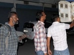 PSPCL officials checking consumer meter reading on his Electricity meter in Ludhiana. (HT Photo)