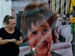 A memorial for Nancy Guthrie is seen.