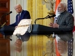 PM Modi (R) and US President Donald Trump seen together.