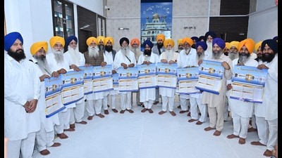 Acting Akal Takht jathedar Giani Kuldeep Singh Gargaj and SGPC president Harjinder Singh Dhami released the calendar of Nanakshahi Samvat 558 (year 2026-27) in Amritsar on Friday. (HT Photo) Acting Akal Takht jathedar Giani Kuldeep Singh Gargaj and SGPC president Harjinder Singh Dhami released the calendar of Nanakshahi Samvat 558 (year 2026-27) in Amritsar on Friday. (HT Photo)