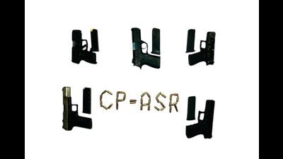 The recovered weapons include one .30 bore, one 9MM Glock, one .30 bore PX5, one 9MM Taurus and one 9MM Gretta, along with 34 live cartridges. (HT) The recovered weapons include one .30 bore, one 9MM Glock, one .30 bore PX5, one 9MM Taurus and one 9MM Gretta, along with 34 live cartridges. (HT)