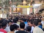 People gathered outside the Uttam Nagar Police Station over the death of a Delhi resident, Tarun due to an alleged fight during Holi.