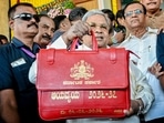 Chief minister Siddaramaiah arrives to present the state Budget for the financial year 2026-27 at Vidhana Soudha in Bengaluru on Friday. (PTI)