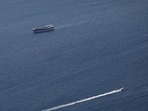Boats in the Strait of Hormuz amid the US-Israeli conflict with Iran, as seen from Musandam, Oman.