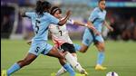 Japan’s Hinata Miyazawa, who scored a hat-trick, shoots for goal as India’s Juli Kishan attempts to block in their AFC Women's Asian Cup match in Perth on Saturday. (AFP)