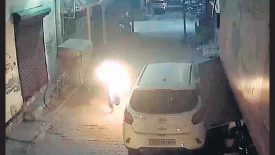CCTV grab of the accused engulfed in flames in New Madhopuri, Ludhiana, on Saturday. (HT Photo) CCTV grab of the accused engulfed in flames in New Madhopuri, Ludhiana, on Saturday. (HT Photo)