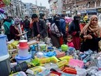 People stepped out of their houses after restrictions were lifted in Srinagar on Saturday. (PTI)