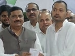Nishant Kumar, son of Bihar CM Nitish Kumar, being given JD(U) party membership receipt in Patna on Sunday, March 8, 2026.