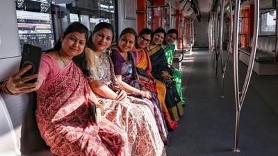 Gram it: The newly inaugurated Delhi Metro corridor, connecting Majlis Park and Maujpur-Babarpur, is now the latest selfie points for many commuters travelling on this route. Here's how some women passengers clicked a selfie, inside the Delhi Metro train inaugurated by Prime Minister Narendra Modi on Sunday. (Photo: PTI)