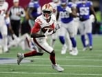 San Francisco 49ers wide receiver Brandon Aiyuk (11) carries the ball against the Seattle Seahawks San Francisco 49ers wide receiver Brandon Aiyuk (11) carries the ball against the Seattle Seahawks