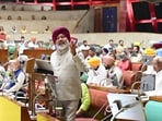 Finance minister Harpal Singh Cheema presenting the budget on Sunday. (Ravi Kumar / HT)