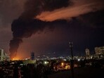 Flames and smoke rise from an oil storage facility struck by the the US–Israeli military campaign, in Tehran, Iran.