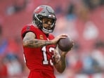 Mike Evans #13 of the Tampa Bay Buccaneers warms up prior to the game against the Carolina Panthers