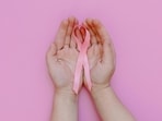Breast cancer grades indicate how abnormal the cancer cells look under a microscope and how quickly they're growing.