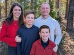 Laura Hughes, widow of a teacher killed during a prank chase, is advocating for the charges against the students to be dropped, highlighting her husband's love for them.