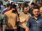 Mukesh Ambani (L) and Radhika Ambani (R) walking into Mumbai's Rameshwaram Cafe amid tight security. Mukesh Ambani (L) and Radhika Ambani (R) walking into Mumbai's Rameshwaram Cafe amid tight security.
