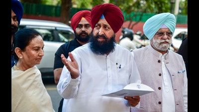 Leader of Opposition Partap Singh Bajwa, along with other Congress leaders, speaking with mediapersons after submitting a memorandum to the Governor at Punjab Lok Bhavan in Chandigarh on Monday. (PTI)