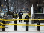 Toronto Police officers work around the scene of a shooting at the US Consulate in Toronto, Canada, on March 10, 2026. Shots were fired at the US consulate in Toronto early Tuesday but no one was injured, police said, days after Middle East war protests outside the building. (Photo by Cole BURSTON / AFP) Toronto Police officers work around the scene of a shooting at the US Consulate in Toronto, Canada, on March 10, 2026. Shots were fired at the US consulate in Toronto early Tuesday but no one was injured, police said, days after Middle East war protests outside the building. (Photo by Cole BURSTON / AFP)