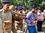 Students being detained outside the Law Auditorium at Panjab University in Chandigarh on Monday. (Keshav Singh/HT)
