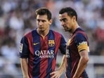 Lionel Messi and Xavi for Barcelona.