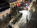 Emergency services work near the charred shell of a bus that caught fire in Kerzers, Switzerland, Tuesday, March 10, 2026 Emergency services work near the charred shell of a bus that caught fire in Kerzers, Switzerland, Tuesday, March 10, 2026