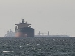 Tankers sail in the Gulf, near the Strait of Hormuz, as seen from northern Ras al-Khaimah, near the border with Oman’s Musandam governance