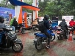 People queueing up at a petrol pump in Noida