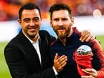 Xavi Hernandez and Lionel Messi.