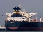 The Liberia-flagged Suezmax tanker Shenlong carrying crude oil berths at the Jawahar Dweep terminal of Mumbai Port in Mumbai